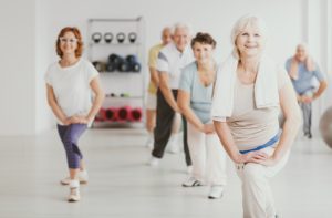 A group of seniors in an exercise class to ensure they promote healthy joints as they age